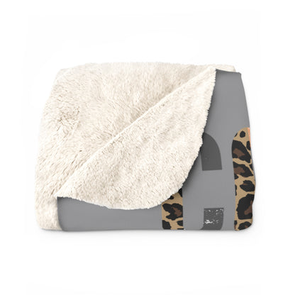 Grey Christmas sherpa fleece blanket with cozy holiday word art design