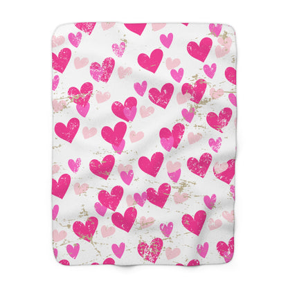 White Valentine’s sherpa fleece blanket with pink distressed heart pattern