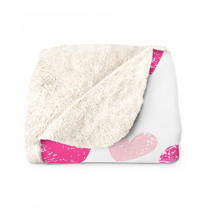 White Valentine’s sherpa fleece blanket with pink distressed heart pattern