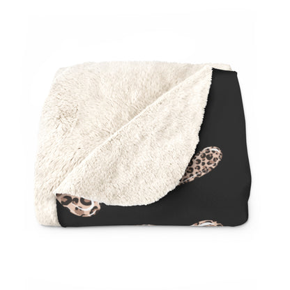 Black Valentine’s sherpa fleece blanket with leopard heart pattern
